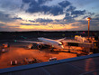 Narita aiport with airplane ready to takeoff at sunset