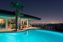 Illuminated Pool At Night With City In Background, Los Angeles, California, United States