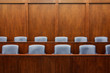 © Mint Images - Empty chairs in jury box