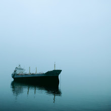 View Of Cargo Ship Moored In Sea