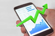 Mobile device stock market success with rising bull trend.  Financial freedom.