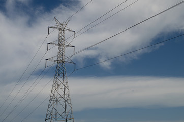 high voltage pole and blue sky.