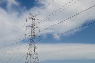 high voltage pole and blue sky.