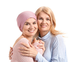 Poster - Woman after chemotherapy with her mother on white background