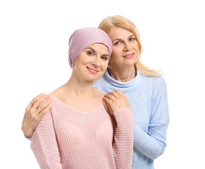 Poster - Woman after chemotherapy with her mother on white background