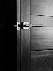 interior wood doors with a metal handle