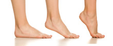 Side View Of Female Bare Foot In Three Different Positions On White Background