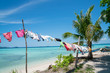 Clothes washed and hanging in tropical sun  and wind to dry.
