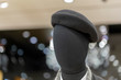 Traditional female gray beret hats on mannequin in a mall