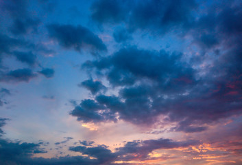 Sunset sky with yellow sun, beautiful background.