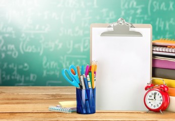 Poster - Assortment  of School supplies on  background