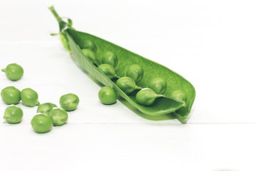 green pea pod, green peas, white background, close up