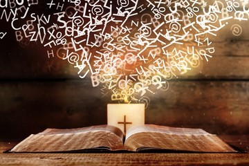 Wall Mural - Open book on table, close-up view