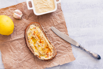 Hummus sandwich with country rustic bread. Top view, above view or overhead view composition