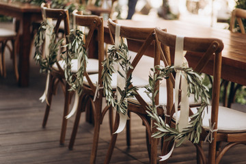 Boho wedding chair with eco decor for guests.