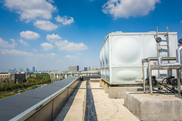 Poster - This photograph represents an industrial air conditioning unit cooling system on the roof of a building