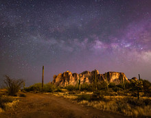 The Iconic Superstition Mountains East Of Phoenix, Arizona Glow Under The Desert Night Sky And The Epic Milky Way Our World Under Our Universe In Star Filled Dark Skies Is Natural Beauty