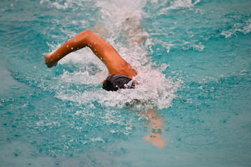 Canvas Print - The swimmer swimming in the swimming pool