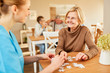 © Robert Kneschke - Demented senior nurse plays puzzle