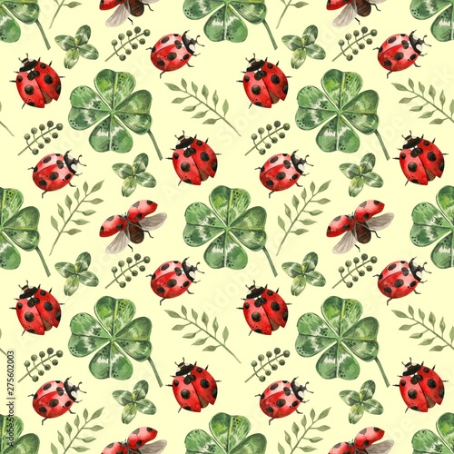 Beautiful seamless background with flowers and clover leaves using ladybugs a...