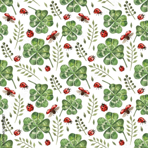 Beautiful seamless background with flowers and clover leaves using ladybugs a...