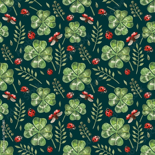 Beautiful seamless background with flowers and clover leaves using ladybugs a...