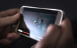 © terovesalainen - Slow internet, video load and download speed. Watching movie online. Loading icon on screen. Frustrated angry person with poor and bad broadcast connection for entertainment. Man with mobile phone.
