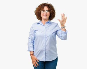 Beautiful middle ager senior businees woman wearing glasses over isolated background showing and pointing up with fingers number five while smiling confident and happy.