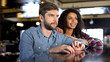 © motortion - Nervous couple supporting national team, watching sport competition online
