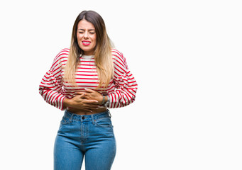 Poster - Young beautiful woman casual stripes winter sweater over isolated background with hand on stomach because indigestion, painful illness feeling unwell. Ache concept.