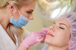 © Nejron Photo - Woman getting treatment with injectable hyaluronic acid dermal filler