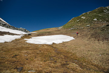 Wall Mural - hikers near the forca di larecchio in piedmont, italy.