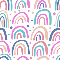 Polka dot wallpaper. Hand drawn rainbows seamless pattern.