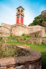 Wall Mural - beautiful landscape with a clock and bell tower in the old fortress in kerkira, corfu, greece. popul