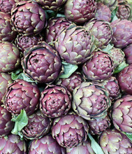 Artichokes Freshly Picked From The Field For Sale In The Fruit A