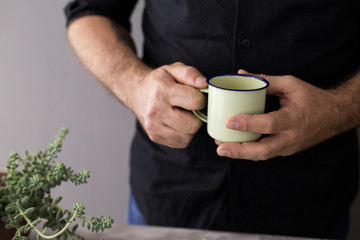 Sticker - man holding a coffee