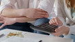 © motortion - Wife and husband calculating family budget, financial crisis, low salary closeup