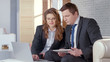 © motortion - Business lady and man checking presentation on laptop, collaborate in business
