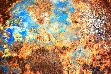 Multi Colored Background, Rusty Metal Surface With Blue Point Texture Flaking And Cracking.