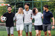 © Тарас Нагирняк - Young football team. Friends play sports. Team  ready to play game.