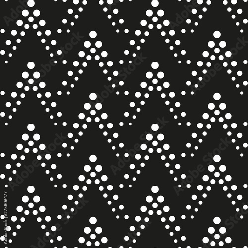 Geometric ornament of dots. Pattern of white dots on a black background. Vect...