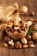 Poster - organic mix nuts on a wooden table