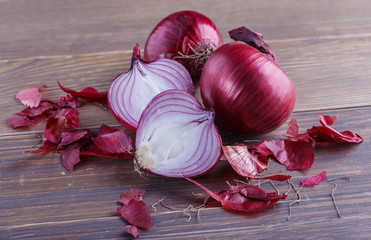 red onions on rustic wood