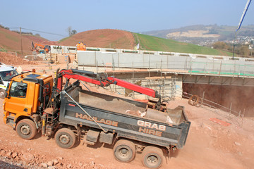 Wall Mural - Truck by a Road bridge under construction