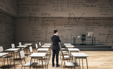 Wall Mural - Businessman in contemporary classroom