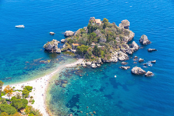 Aerial view of Isola Bella island and beach in Taormina, Sicily, Italy. Giardini-Naxos bay, Ionian sea coast. Isola Bella (Sicilian: Isula Bedda) also known as The Pearl of the Ionian Sea