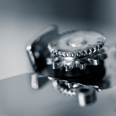 Black and white macro close up of gear/wheel of can opener