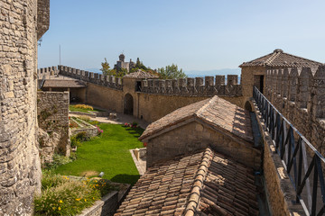 The picturesque old fortress on the top of a cliff in San Marino.