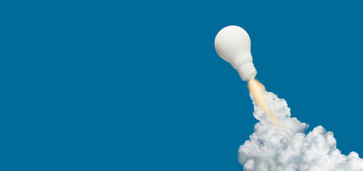 ideas inspiration concepts with rocket lightbulb on blue background.business start up or goal to suc
