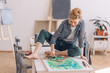 © alfa27 - visionary, dreamer concept. girl painting a colorful picture.full length photo